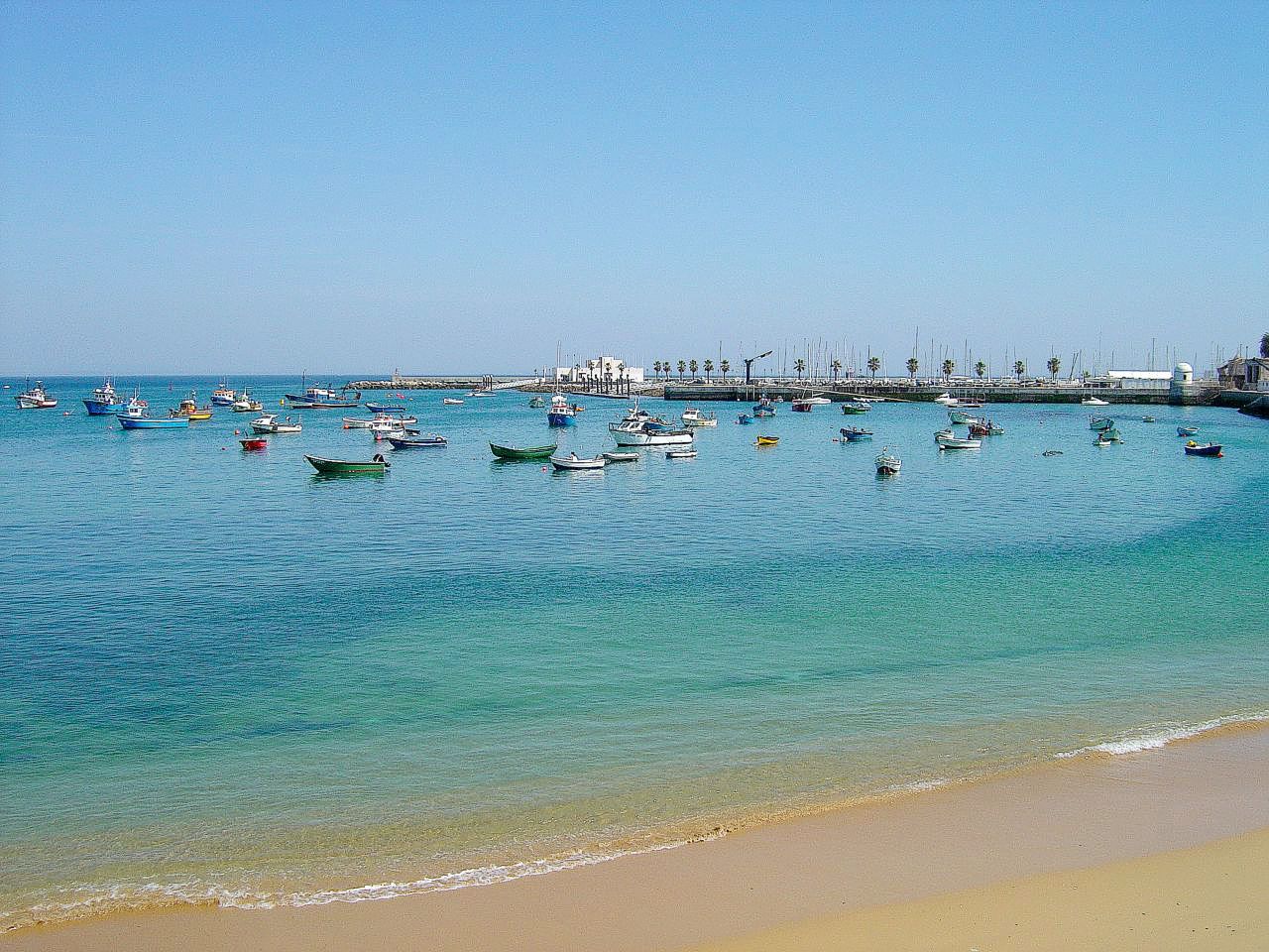Ribeira beach with Cascais Marina in the background, Portugal