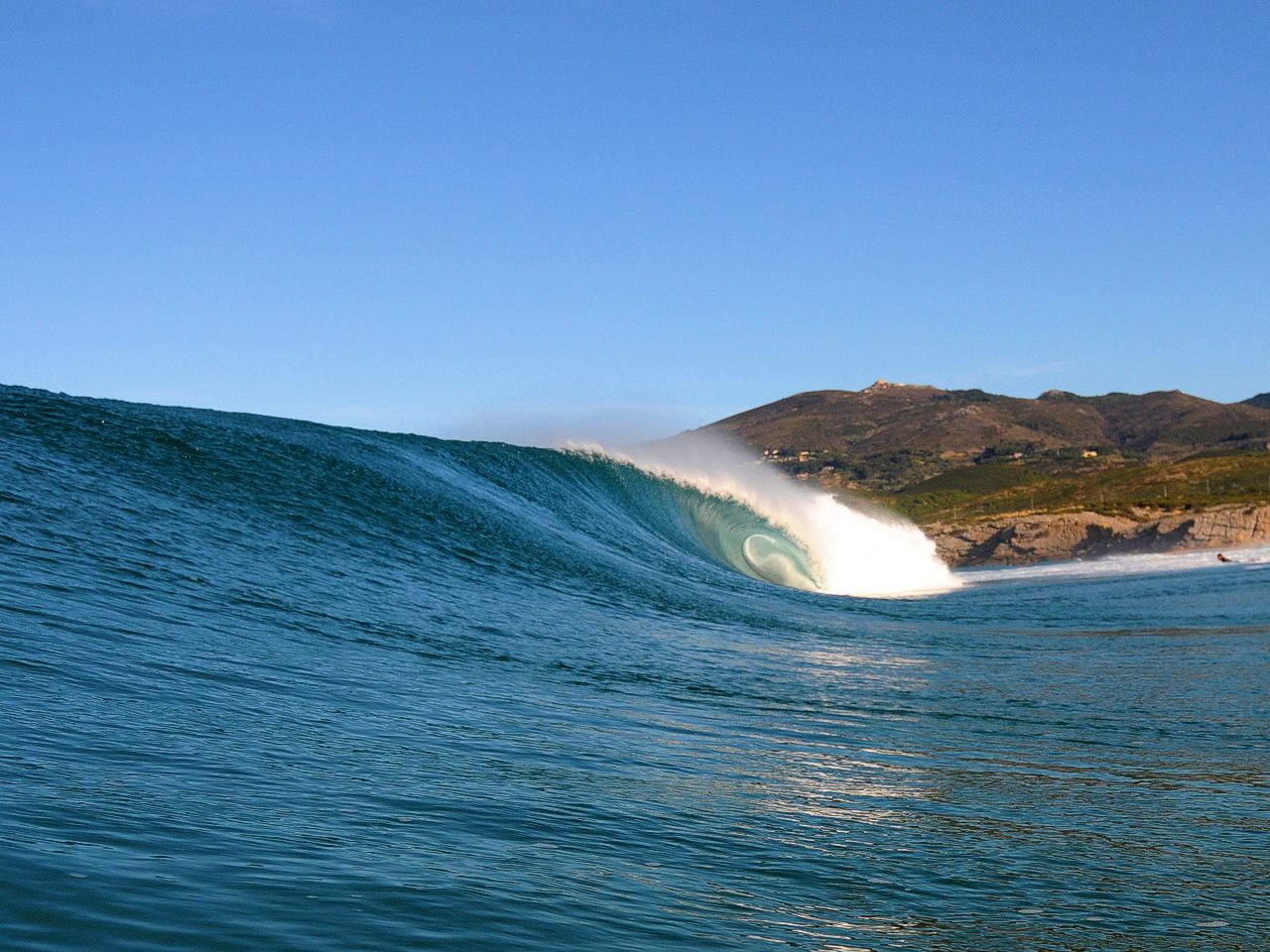 Surf wave at Guincho Beach in Cascais, Portugal