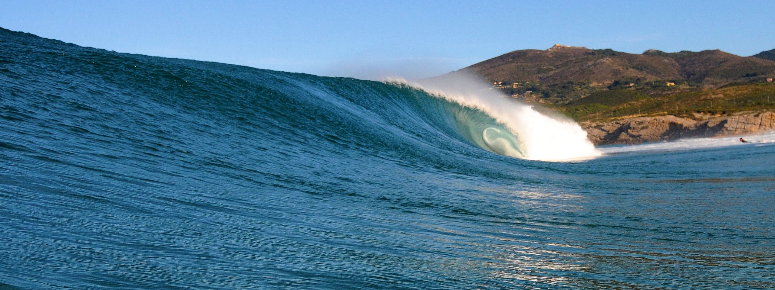 Surf wave at Guincho Beach in Cascais, Portugal